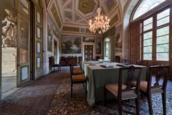 Dining room in venetian villa with statue